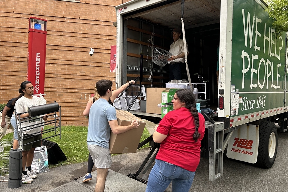 St. John's community members loading donations into truck